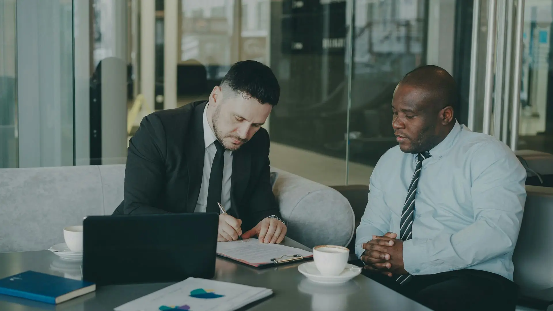 Colleagues working through a business plan